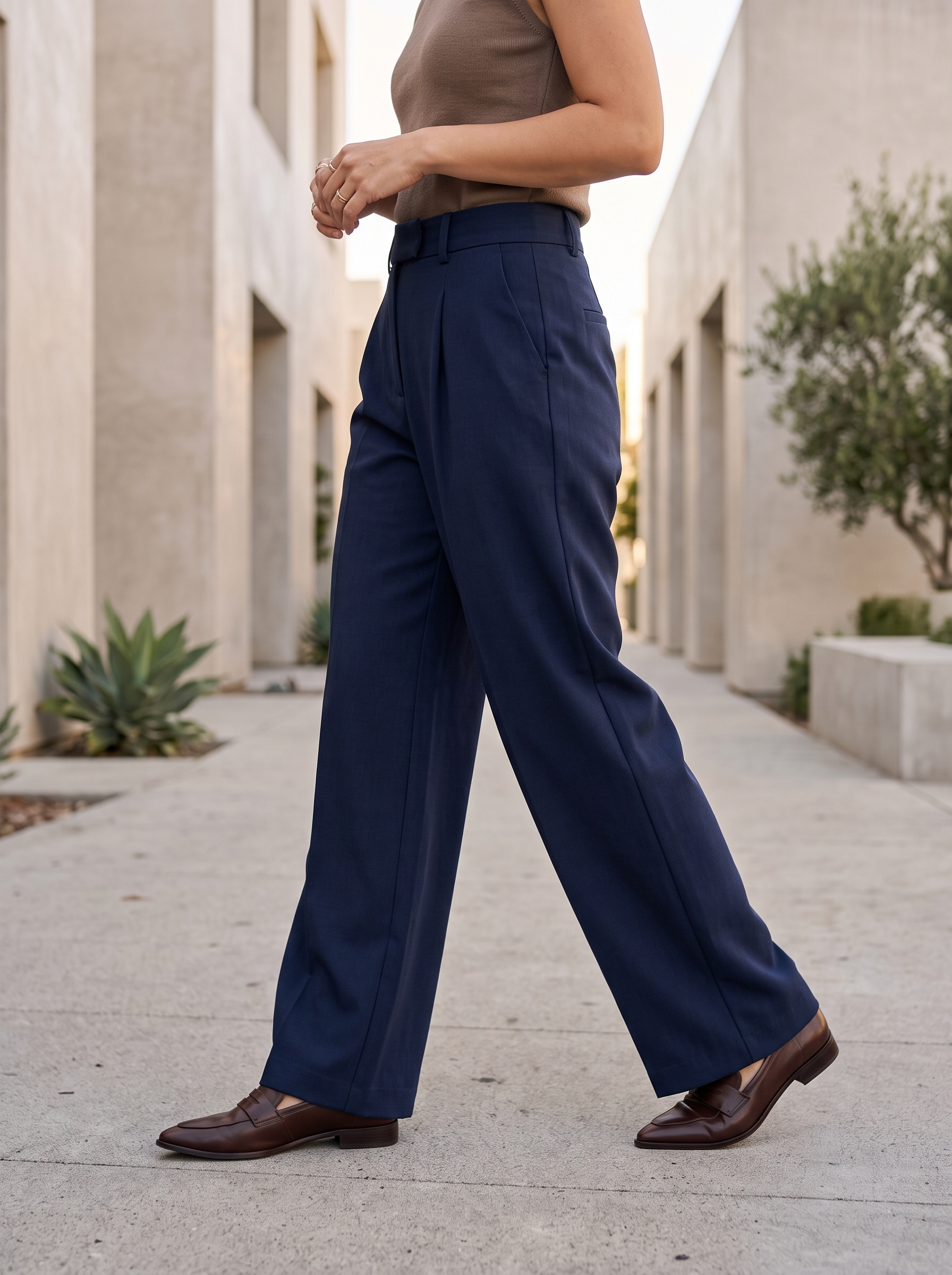 Editorial portrait of an adult female model wearing PRETTYGARDEN Women's Tailored Wide Leg Work Dress Pants