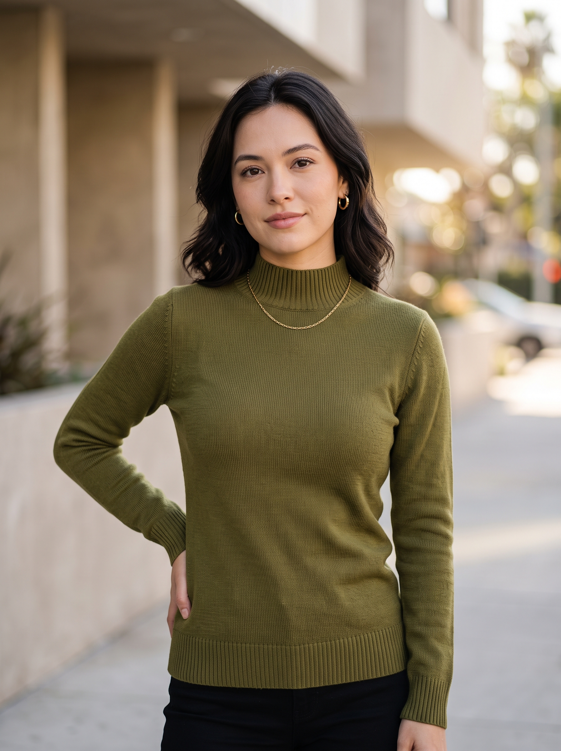 Editorial portrait of an adult female model wearing Chanyarn Women's 100% Merino Wool Seamless Sweater Mock Neck First-Line Ready to Wear Long Sleeve Knitted Pullover Tops