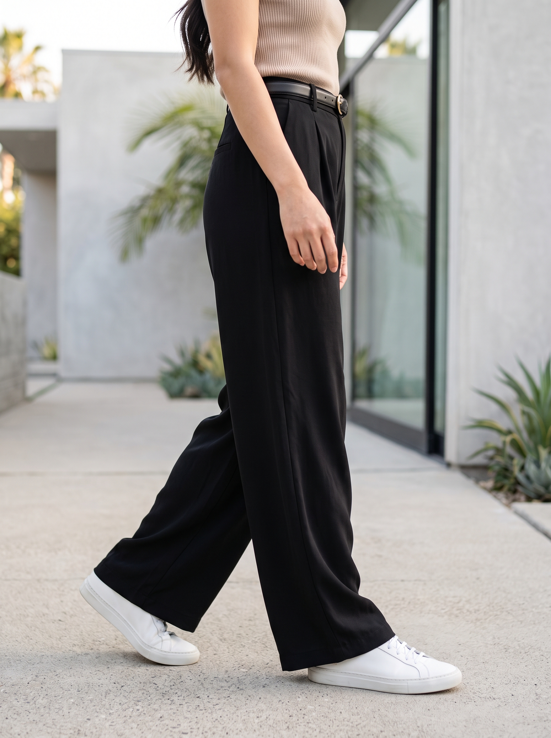 Editorial portrait of an adult female model wearing PRETTYGARDEN Womens Wide Leg Dress Pants Flowy Trousers
